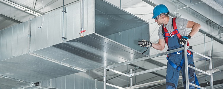 Man inspecting Ductwork