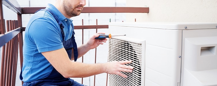 Man installing air conditioner